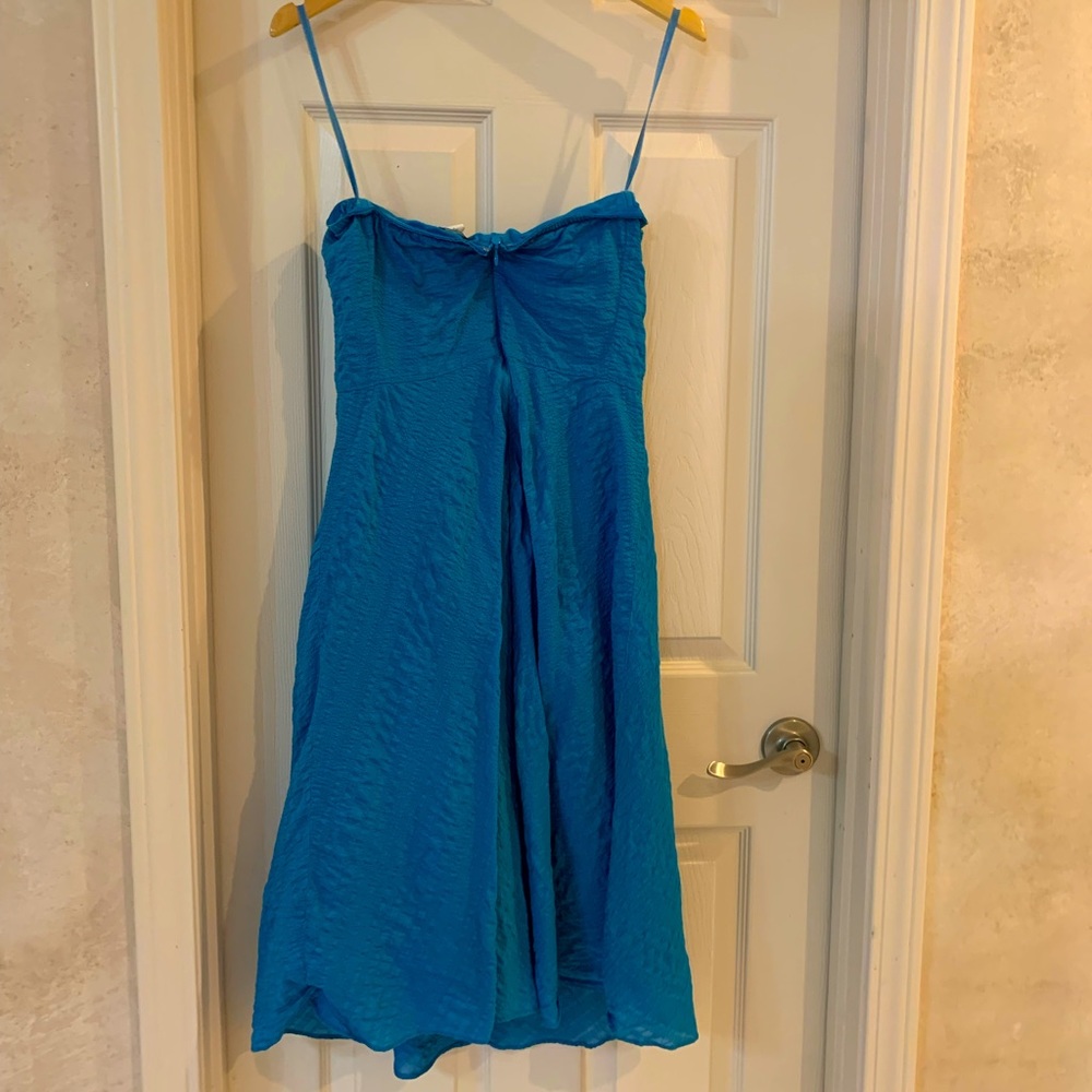 J-Crew strapless, tea length teal dress.